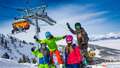 Bus group of skiers on the slopes of Hauser Kaibling