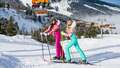 Two ladies skiing Hauser Kaibling in Styria